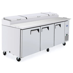 Atosa MPF8203GR 93-inch triple door stainless steel refrigerated pizza prep table with lid closed, angled view