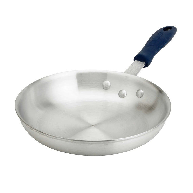 Browne REGULAR natural finish aluminum fry pan with blue silicone sleeve on the handle, angled view