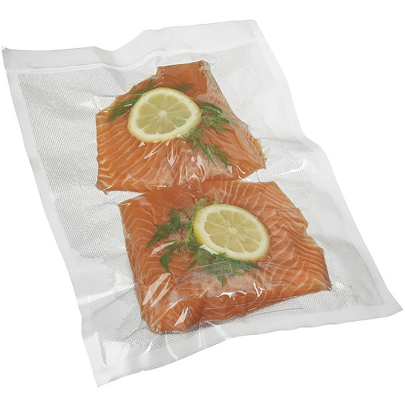 Hamilton Beach textured external chamber vacuum bag sealed around two salmon fillets with lemon slices and dill