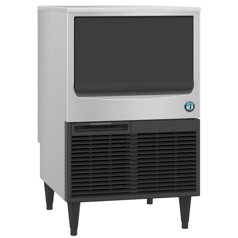 Hoshizaki KM-116BAK under counter crescent ice machine in stainless steel with black grille, angled front view