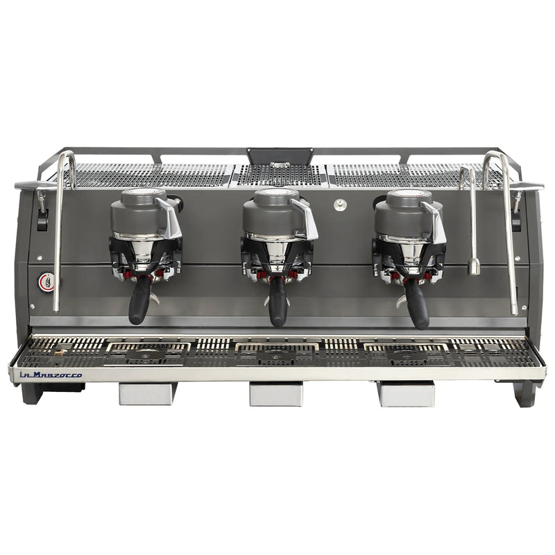 La Marzocco STRADA-X-3-GR three group espresso machine, front view of the dark body with three exposed group heads