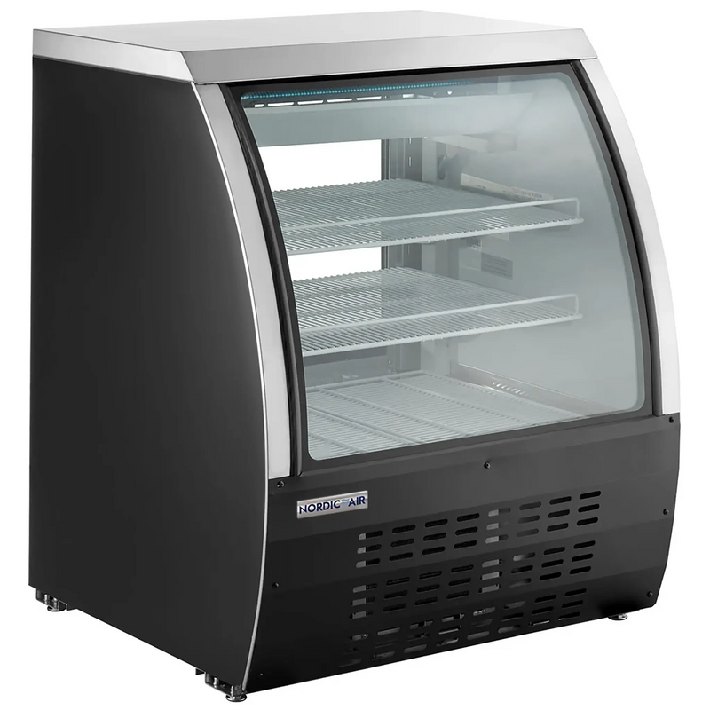 Nordic Air DDC-36 36-inch curved glass refrigerated deli case with black exterior and glass shelves, angled view