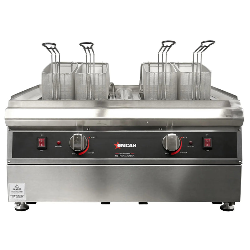 Omcan 41883 240V double countertop electric pasta cooker in stainless steel with two wells of baskets, front view