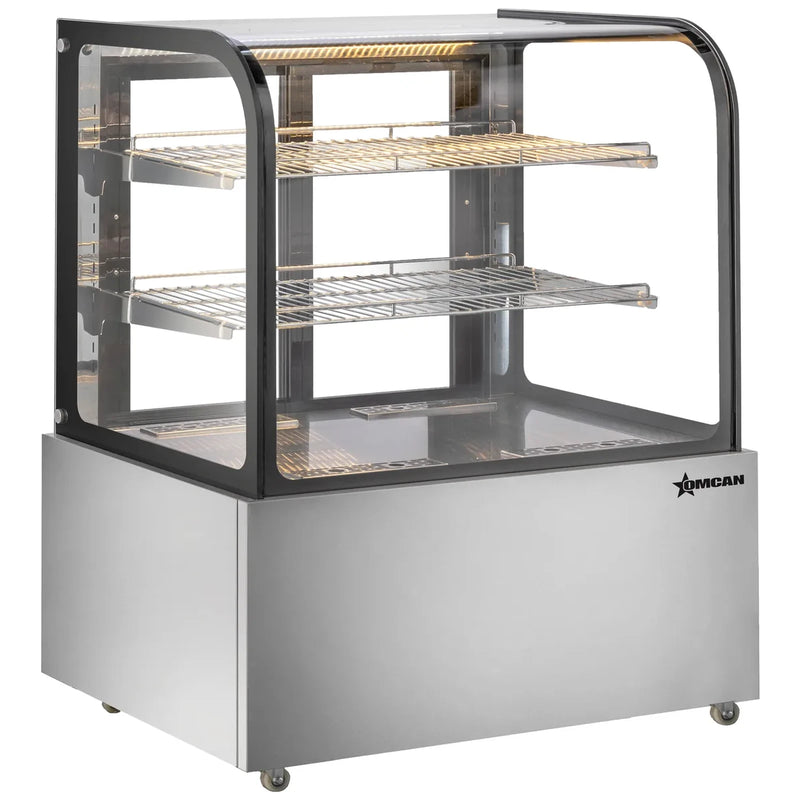 Omcan 48389 49-inch curved glass floor display warmer with 2 shelves and stainless steel base, angled view