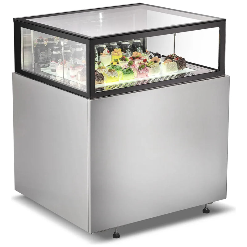Omcan 48561 36-inch stainless steel flat top refrigerated pastry showcase stocked with cakes and desserts, angled view