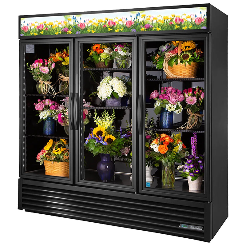 True GDM Series 78-inch black triple swing glass door flower display refrigerator filled with bouquets