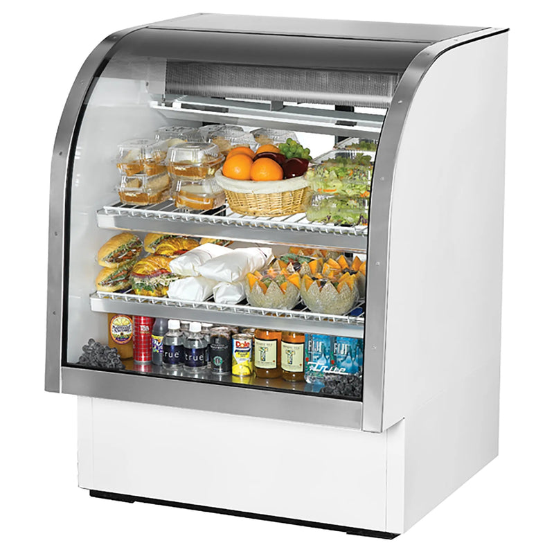 True TCGG-36-HC-LD 36-inch white curved glass refrigerated deli case with stainless trim, stocked with food