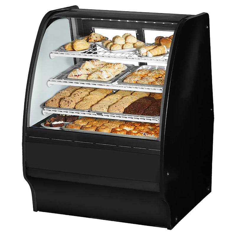 True TGM-DC-36-SC/SC-B-W 36-inch black curved glass dry display case with baked goods on wire shelves