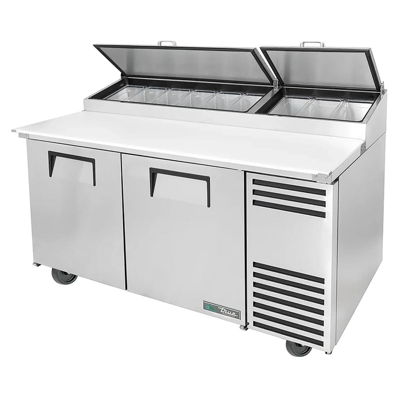 True TPP-AT-67-HC 67" two door stainless steel pizza prep table with split lids raised and white cutting board