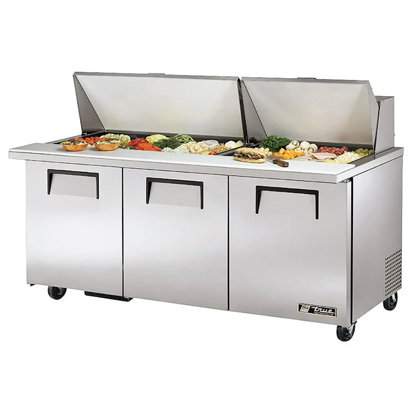 True TSSU-72-30M-B-ST-HC 72" mega top sandwich prep table with both split lids open over toppings, front view