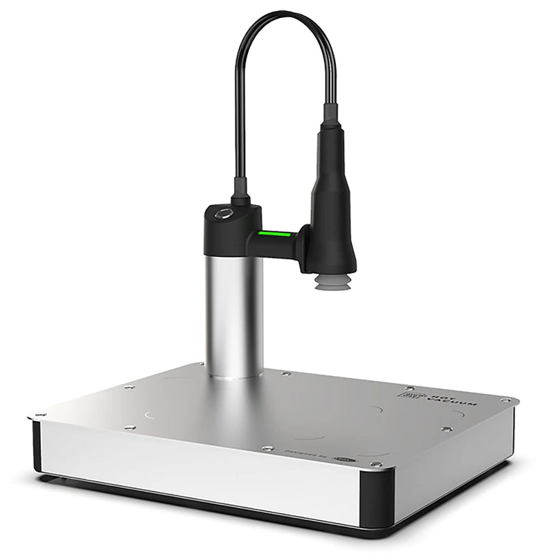 Unox XUC175 vacuum platform, stainless steel base with flexible black vacuum arm and nozzle, angled view