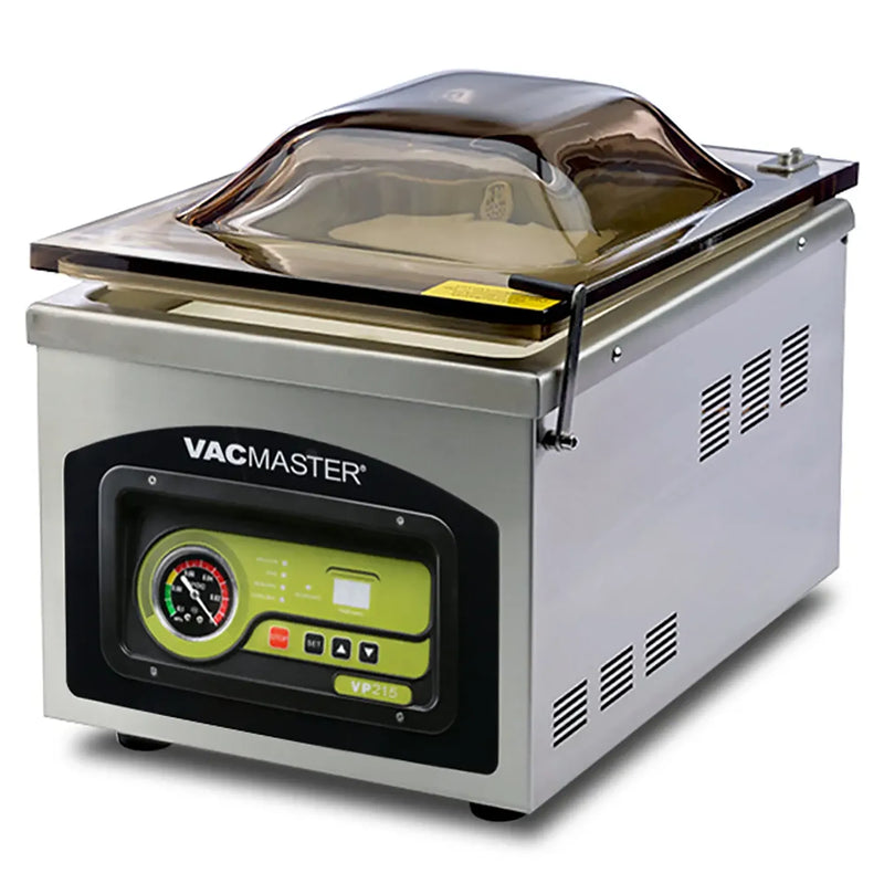 VacMaster VP215 stainless steel countertop chamber vacuum sealing machine with tinted domed lid closed, angled view
