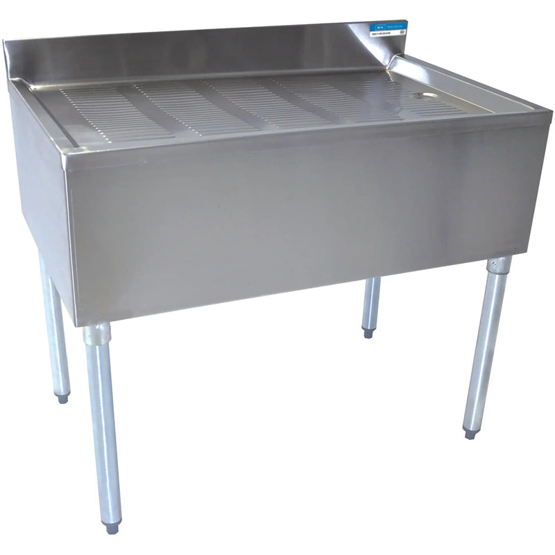 BK Resources UB4-DB18 18-inch wide stainless steel underbar drainboard with ribbed top and backsplash
