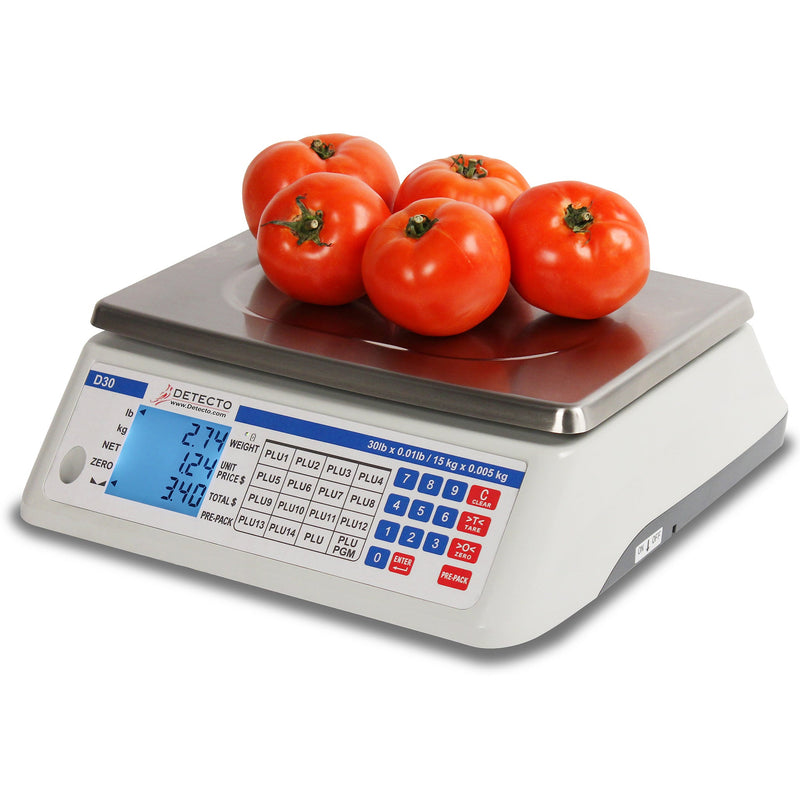 Detecto D Series price computing scale weighing tomatoes on the stainless steel tray, white body with LCD display