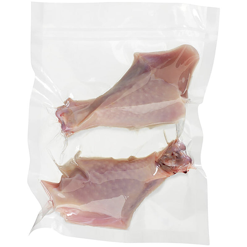 Hamilton Beach smooth in-chamber vacuum bag, clear pouch vacuum sealed around two raw poultry legs