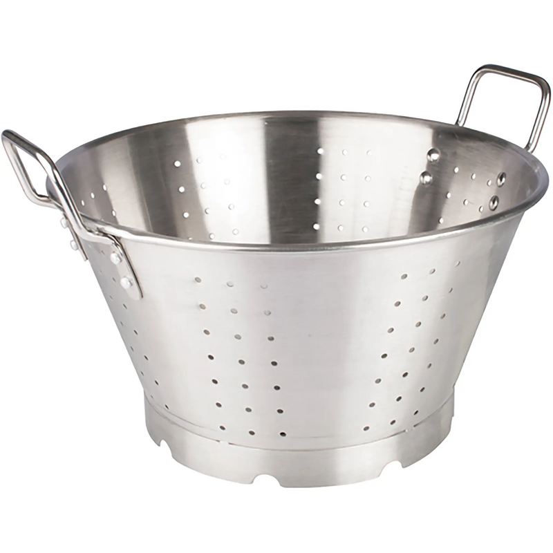 Winco stainless steel colander with two loop handles, perforated bowl and sturdy ring base, angled side view
