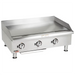 APW Wyott EG-36S heavy duty electric 36-inch griddle in stainless steel with three control knobs and grease trough, front