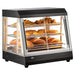 Alpha APDW-26 26-inch heated glass display food warmer with three wire shelves holding baked goods, black base