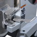 Alpha AVP-10 10 qt planetary stand mixer, close-up of the ingredient chute on the bowl guard and safety label