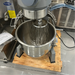 Certified used Alpha AVP-20 20 qt mixer, close-up of the stainless steel bowl with the wire whisk attachment inside