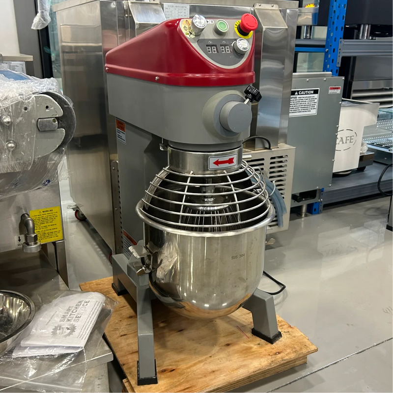 Certified used Alpha AVP-20 20 qt planetary stand mixer, grey with a red head, on a pallet, angled front view