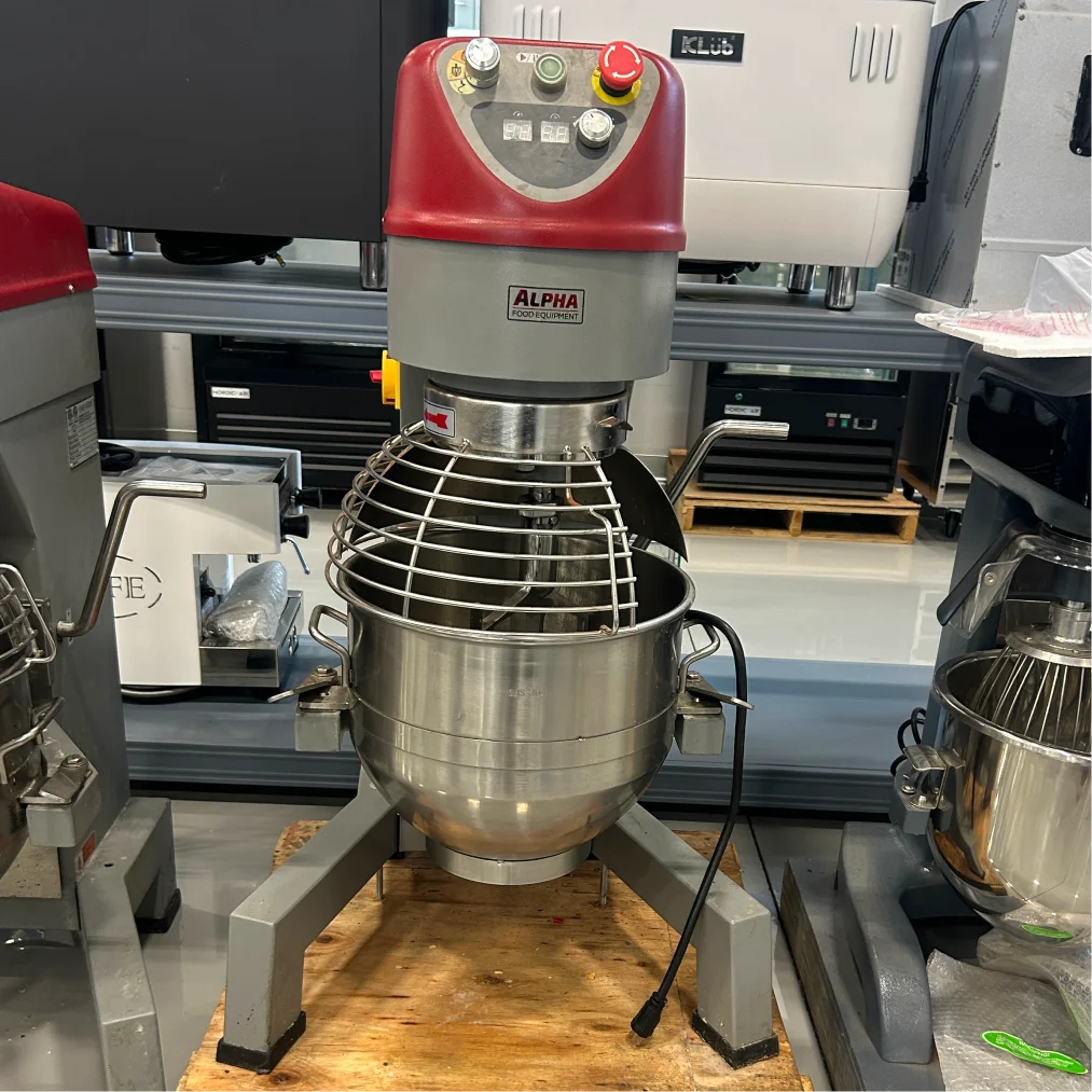Certified used Alpha AVP-30 30 qt planetary stand mixer on a pallet, front view with the bowl guard and power cord
