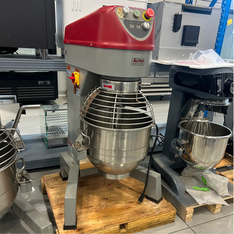 Certified used Alpha AVP-30 30 qt planetary stand mixer on a pallet in the warehouse, angled front view