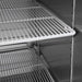 Atosa MBF8502GR reach-in freezer, close-up of the interior coated wire shelves and stainless steel walls
