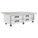 Atosa MGF8454GR 76-inch refrigerated chef base with a flat stainless steel top and four drawers, angled view