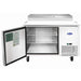 Atosa MPF8201GR 44-inch pizza prep table with the door open showing the refrigerated base and wire shelf