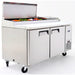 Atosa MPF8202GR 67-inch pizza prep table with the lid open and topping pans filled with ingredients