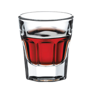 Browne CASABLANCA 1.25 oz clear paneled whisky shot glass with heavy base, shown filled with red liquor