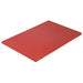 Browne colour-coded cutting board in red polyethylene, rectangular board shown from an angled top view