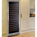 Eurodib USF168 tall glass door wine cooler shown installed in a white kitchen beside cream cabinetry