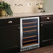 Eurodib USF54 under counter wine cooler installed beneath a granite countertop, alternate view of the glass door