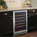 Eurodib USF54 under counter wine cooler with glass door and wood shelves, installed in dark wood kitchen cabinetry