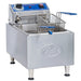 Globe PF10E-C 10 lb electric countertop single well deep fryer in stainless steel with fry basket, angled view