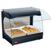Hatco GRCMW-1 single shelf 22 inch open heater merchandiser shown holding white dishes of hot food under the glass