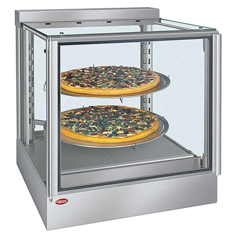 Hatco IHDCH-28 glass display 28 inch pizza/food warmer in stainless steel with two whole pizzas on rack shelves