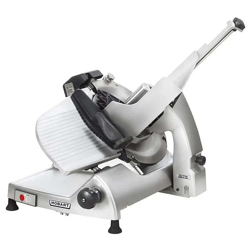 Hobart HS6 Series manual aluminum meat slicer with 13-inch blade, carriage and pusher arm, angled front view