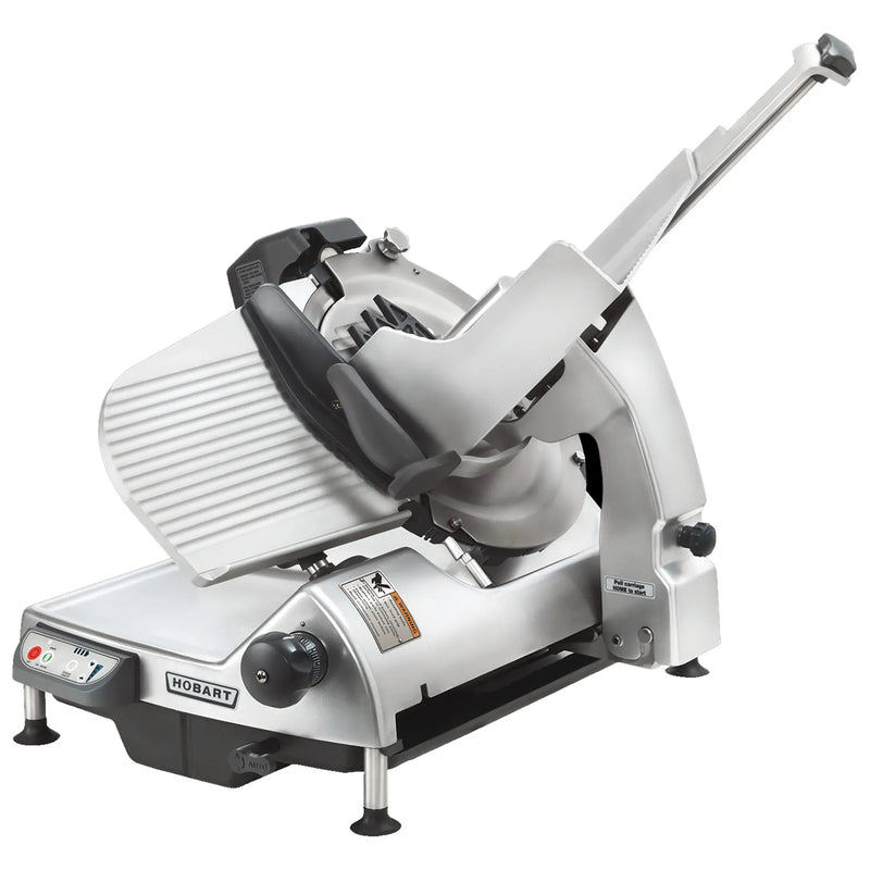 Hobart HS7 Series automatic aluminum meat slicer with 13-inch blade, carriage and pusher arm, angled front view