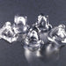 Hoshizaki AM-50BAJ under counter ice machine, close-up of clear top hat cube shaped ice on a dark surface