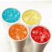 Hoshizaki F-422MAK-C modular ice machine, cubelet ice in four cups with blue, yellow, orange and red syrup