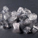 Hoshizaki F-822MAK-C modular ice machine, close-up of clear cubelet shaped ice pieces on a dark surface