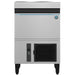 Hoshizaki IM-50BAA-Q sphere ice machine in stainless steel with front door and black vent, straight front view