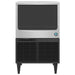 Hoshizaki KM-116BAK under counter crescent ice machine, stainless steel front view with black bin door and legs