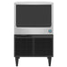 Hoshizaki KM-161BAK under counter crescent ice machine, stainless steel front view with black bin door and legs