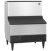 Hoshizaki KM-301BAK under counter crescent ice machine in stainless steel with black bin door, angled front view