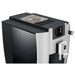 Jura E6 residential automatic coffee machine, high angled view of the lid, ribbed side panel and coffee spout