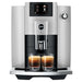 Jura E6 residential automatic coffee machine in platinum with colour display, front view brewing two espressos
